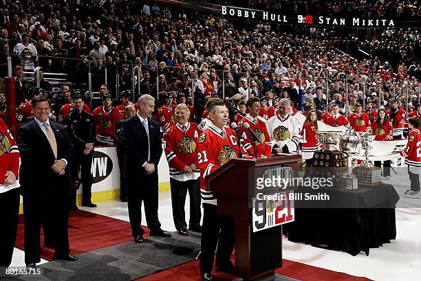 Former player Stan Mikita of the Chicago Blackhawks speaks during a pre-game ceremony in honor of him before the Black Hawks take on the San Jose...