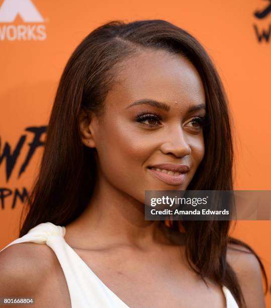 Actress Reign Edwards arrives at the premiere of FX's "Snowfall" at The Theatre at Ace Hotel on June 26, 2017 in Los Angeles, California.