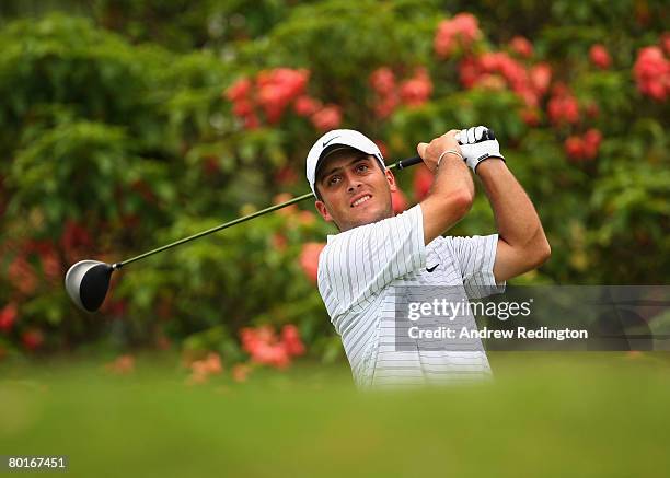 Francesco Molinari of Italy watches his tee-shot on the eighth hole during the third round of the Maybank Malaysian Open held at the Kota Permai Golf...