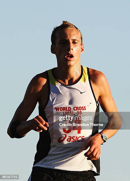 Ryan Gregson of the NSWIS finishes first in the junior boys trial during the Australian selection trials for the 2008 World Cross Country...