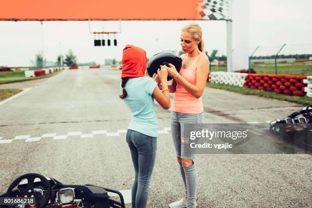 family go-karts - daughter driving stock pictures, royalty-free photos & images