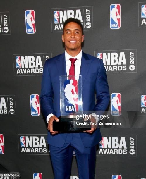 Kia NBA Rookie of the Year winner, Malcom Brogdon poses in the press room at Basketball City - Pier 36 - South Street on June 26, 2017 in New York...