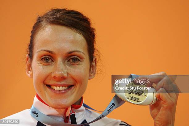 Kelly Sotherton of Great Britain poses with her Silver medal in the Women's Pentathlon during the 12th IAAF World Indoor Championships at the Palau...