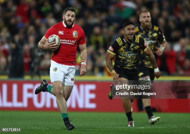 Tommy Seymour of the Lions runs in the opening try during the 2017 British & Irish Lions tour match between the Hurricanes and the British & Irish...