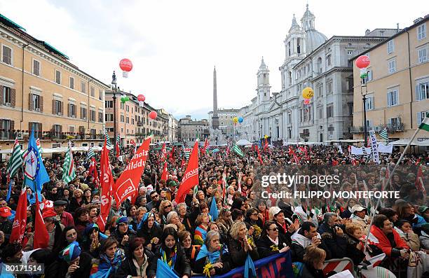 Thousands of people attend Italy's three largest trade unions Cgil, Cisl and Uil national rally in Rome's Piazza Navona in support of women's rights...