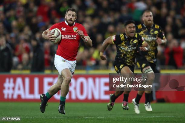 Tommy Seymour of the Lions runs in the opening try during the 2017 British & Irish Lions tour match between the Hurricanes and the British & Irish...