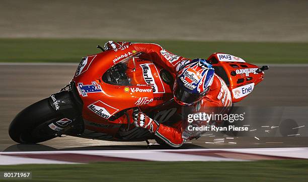 Casey Stoner of Australia and the Ducati Marlboro Team in action during practice for the Motorcycle Grand Prix of Qatar, round one of the MotoGP...