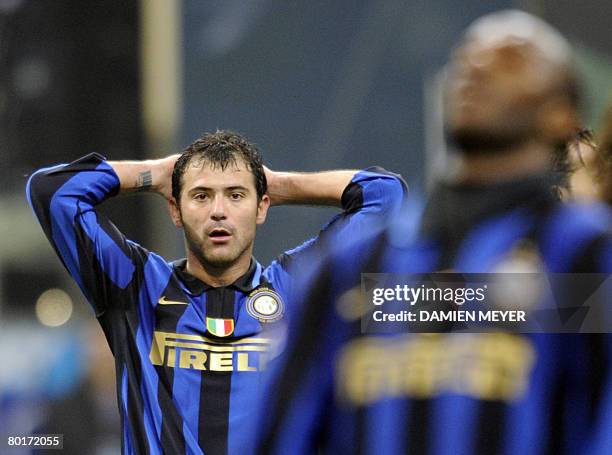Inter Milan's Serbian midfielder Dejan Stankovic reacts after missing a goal during the Italian Serie A football match Inter Milan against Reggina at...