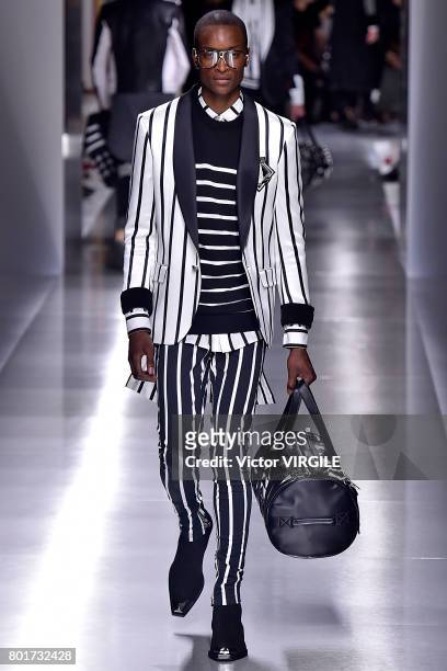 Model walks the runway during the Balmain Menswear Spring/Summer 2018 show as part of Paris Fashion Week on June 24, 2017 in Paris, France.