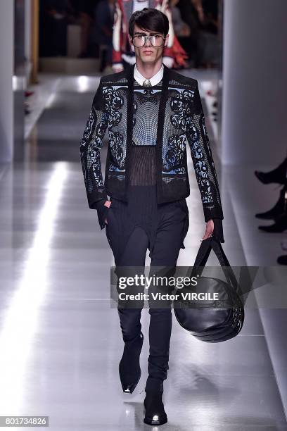 Model walks the runway during the Balmain Menswear Spring/Summer 2018 show as part of Paris Fashion Week on June 24, 2017 in Paris, France.