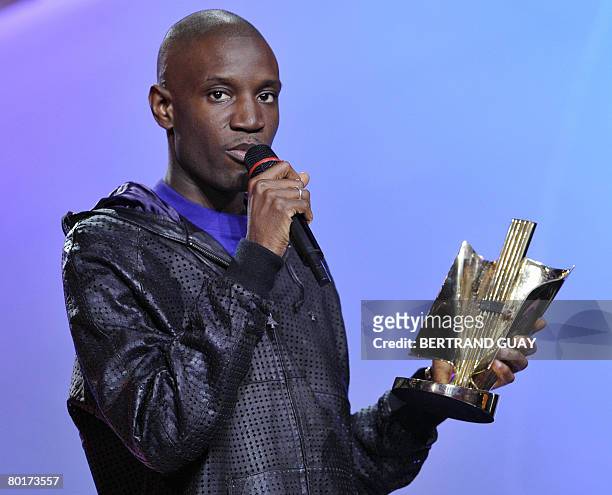 French hip hop singer Abd Al Malik speaks after he received the best male band or artist of the year award during the 23rd Victoires de la Musique...