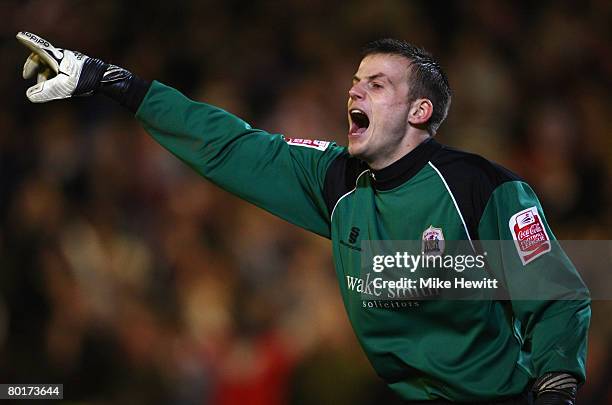 Luke Steele of Barnsley organizes his defence during the FA Cup sponsored by E.ON 6th Round match between Barnsley and Chelsea at Oakwell on March 8,...