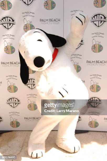 Snoopy poses during The Easter Beagle Presents Canine Couture at Palm Beach Fashion Week sponsored by Warner Home Video to celebrate the release of...