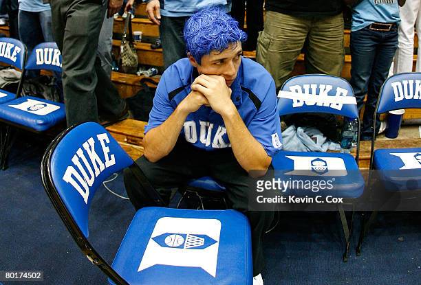 Duke fan reacts after the North Carolina Tar Heels defeated the Blue Devils 76-68 at Cameron Indoor Stadium March 8, 2008 in Durham, North Carolina.