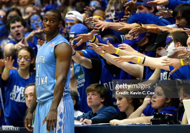 Marcus Ginyard of the North Carolina Tar Heels smiles as he gets heckled by the Cameron Crazies during the second half at Cameron Indoor Stadium...