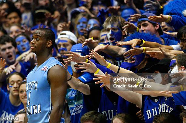 Marcus Ginyard of the North Carolina Tar Heels tries to ignore getting heckled by the Cameron Crazies during the second half at Cameron Indoor...