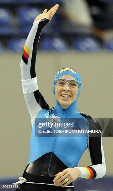 Germany's Anni Friesinger waves after the women's 1,000 metre competition of the World Single Distances Speed Skating Championships in Nagano on...