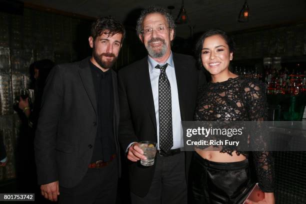 Actor Carter Hudson, executive producer Thomas Schlamme and actor Emily Rios attend the after party for the premiere of FX's "Snowfall" at The...