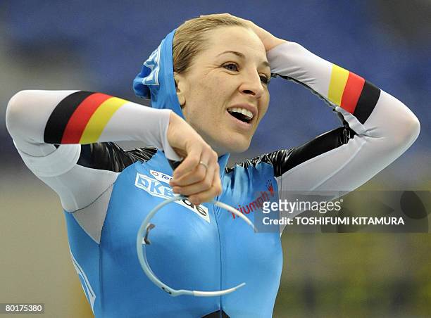 Germany's Anni Friesinger smiles after the women's 1,000 metre competition of the World Single Distances Speed Skating Championships in Nagano on...
