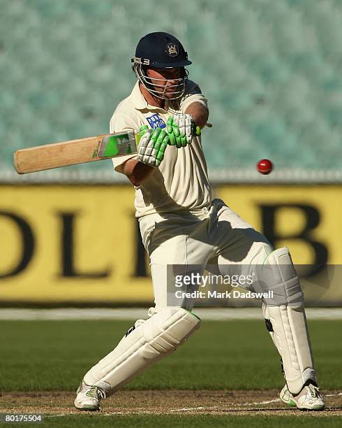 Nick Jewell of the Bushrangers hits for four during day three of the Pura Cup match between the Victorian Bushrangers and the Queensland Bulls at the...