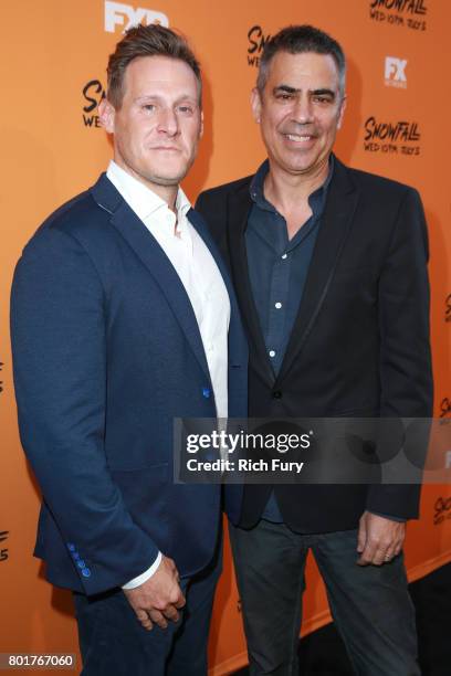 Executive Producers Trevor Engelson and Michael London attend the premiere of FX's "Snowfall" at The Theatre at Ace Hotel on June 26, 2017 in Los...