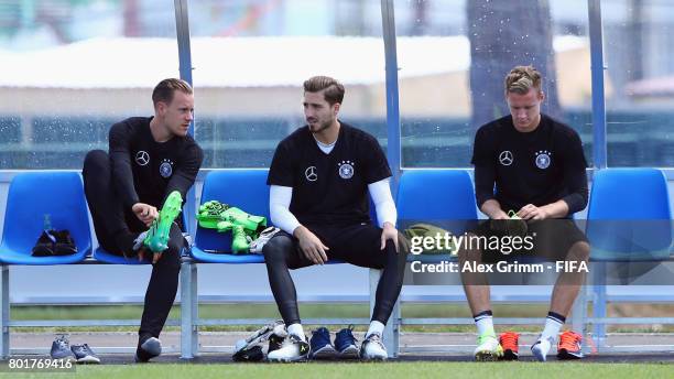 Goalkeepers Marc-Andre ter Stegen, Kevin Trapp and Bernd Leno prepare for a Germany training session at Sotchi Parc Arena ahead of their FIFA...