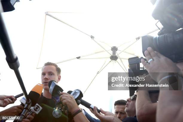 Keeper Marc-Andre ter-Stegen of Germany talks to the media during a mixed zone press conference prior to a team Germany training session at Park...