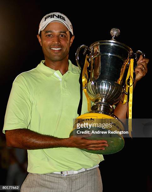 Arjun Atwal of India poses with the trophy after winning the Maybank Malaysian Open held at the Kota Permai Golf & Country Club on March 9, 2008 in...