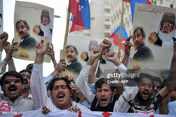 Pakistani students shout slogans and wave placards during a protest rally in Karachi on March 9 held to protest the freedom of judiciary and against...