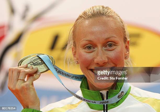 Tamsyn Lewis of Australia poses with her Gold Medal for the Womens 800 metres on the podium during the 12th IAAF World Indoor Championships at the...