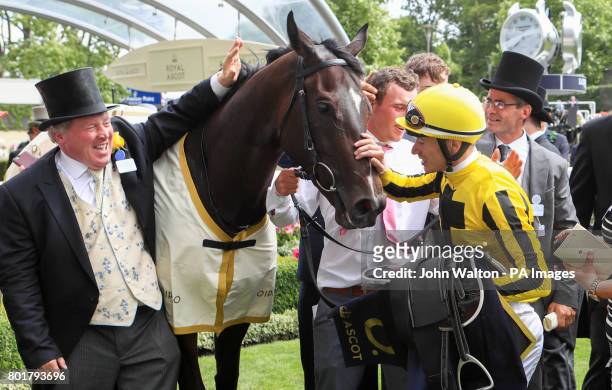 Jockey Antoine Hamelin celebrates winning the Albany Stakes on Different League with Owner Con Marnane during day four of Royal Ascot at Ascot...