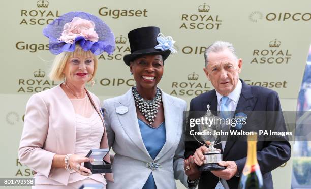 Baroness Floella Benjamin presents a award for The Commonwealth Cup to Derrick Smith during day four of Royal Ascot at Ascot Racecourse.