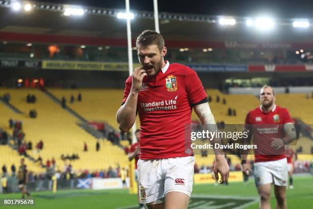 Dejected Dan Biggar of the Lions walks off the pitch after missing with a last gasp drop goal attempt to win the match during the 2017 British &...