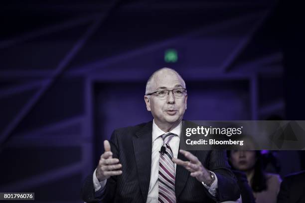 Alex Molinaroli, president of Johnson Controls Inc., speaks during the World Economic Forum Annual Meeting of the New Champions in Dalian, China, on...