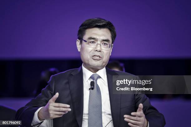 Shu Yinbiao, chairman of State Grid Corp. Of China, speaks during the World Economic Forum Annual Meeting of the New Champions in Dalian, China, on...