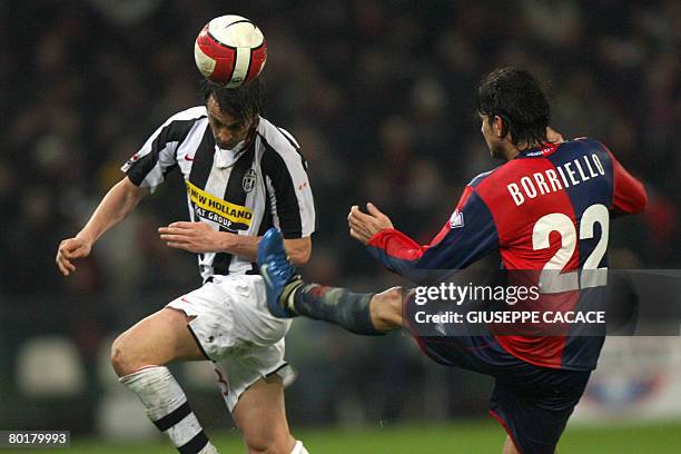 Juventus defender Nicola Legrottaglie heads the ball in front of Genoa's forward Marco Borriello during their "Serie A" football match Genoa vs...