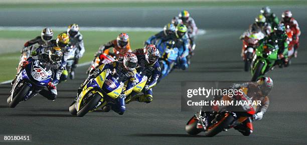 General view of the MotoGP event held under lights at the Losail International Circuit in Doha on March 9, 2008. Australian Ducati rider Casey Stoner...