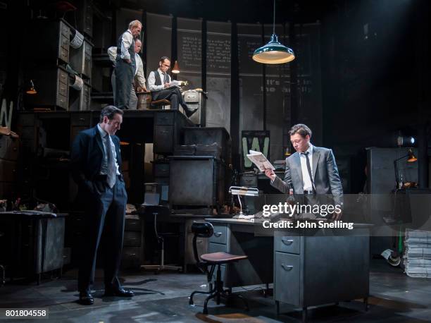 Bertie Carvel as Rupert Murdoch and Richard Coyle as Larry Lamb with the Company perform on stage in a new production of the play "Ink" at The...