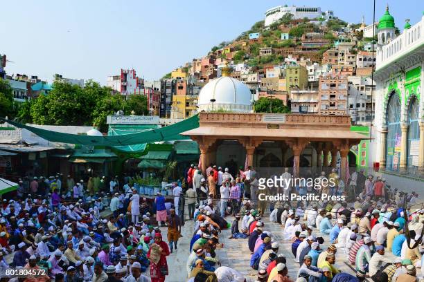 Indian Muslims offer Eid al-Fitr prayers at the dargah khwaja moinuddin chishti. Eid al-Fitr marks the end of the Islamic holy fasting month of...