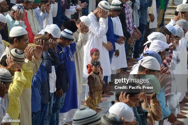 Indian Muslims offer Eid al-Fitr prayers at the dargah khwaja moinuddin chishti. Eid al-Fitr marks the end of the Islamic holy fasting month of...