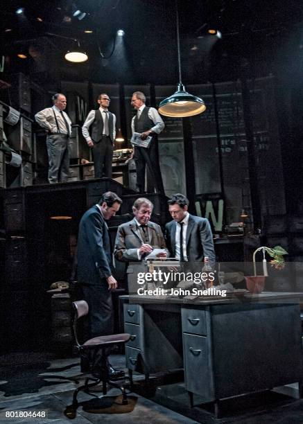 Bertie Carvel as Rupert Murdoch, Geoffrey Freshwater as Sir Alick McKay and Richard Coyle as Larry Lamb with the Company perform on stage in a new...