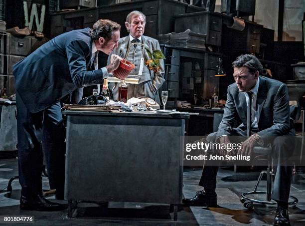 Bertie Carvel as Rupert Murdoch, Geoffrey Freshwater as Sir Alick McKay and Richard Coyle as Larry Lamb with the Company perform on stage in a new...