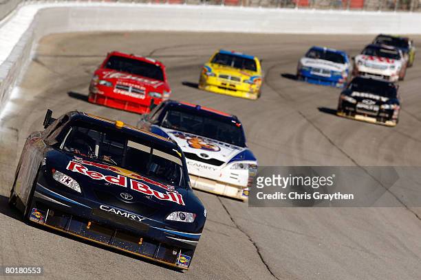 Brian Vickers, driver of the Red Bull Toyota, leads a group of cars during the NASCAR Sprint Cup Series Kobalt Tools 500 at the Atlanta Motor...