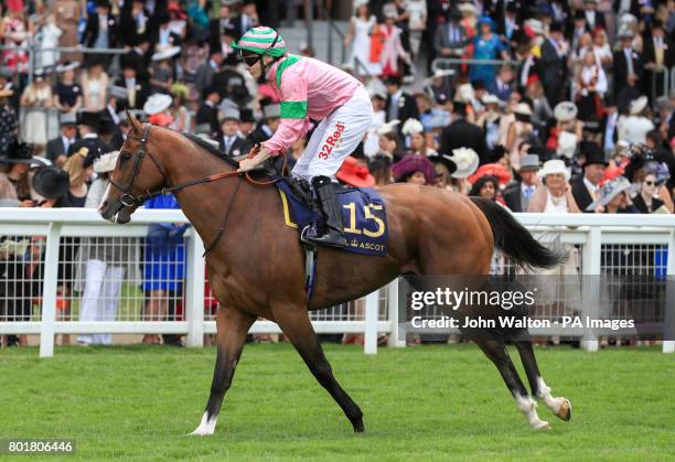 Majeed ridden by jockey Jamie Spencer goes to post for the Wolferton Handicap