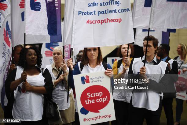 Nurses stage a protest outside the Department of Health on June 27, 2017 in London, England. The Royal College of Nursing have launched a series of...