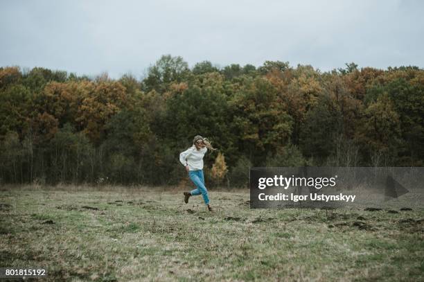 Running In Field 542 Model Running Through Field Stock Photos, High-Res Pictures, and ...