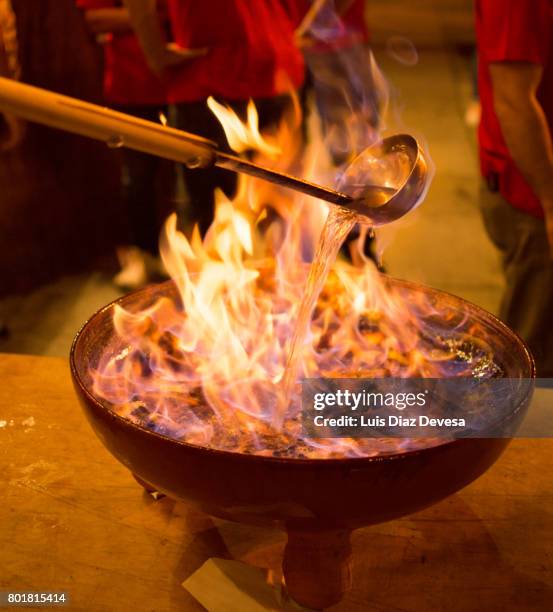queimada is made from licor de orujo - inflamable fotografías e imágenes de stock