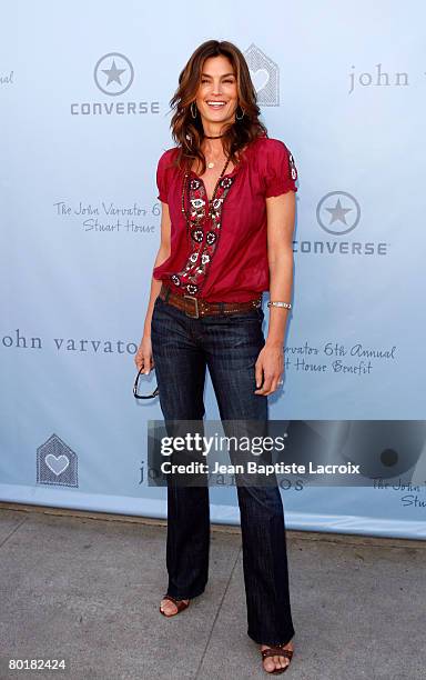 Model Cindy Crawford arrives to the John Varvatos 6th Annual Stuart House Benefit at the John Varvatos store on March 9, 2008 in West Hollywood,...