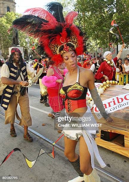 Members of the local Caribbean community dance their way through the city streets during the Moomba Parade in Melbourne on March 10, 2008. The parade...