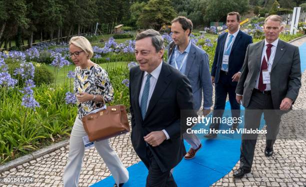 President Mario Draghi arrives accompanied by ECB Director General Communications Christine Graeff to deliver the opening speach at the first...